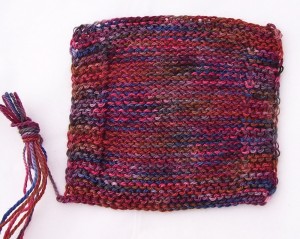 Variegated yarn swatch reverse stockinette